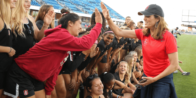 Coach high five girls soccer